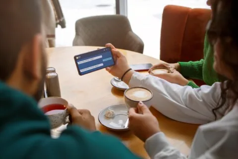 a group of people sitting at a table